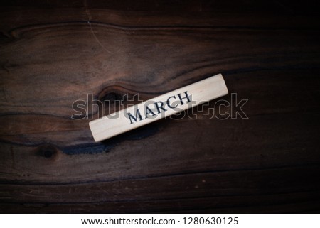 Wooden accessories written as March