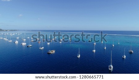 boat in a lagoon in aerial view, Papeete French Polynesia