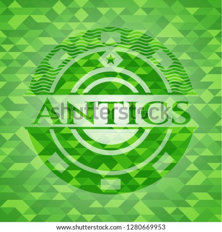 Antics green emblem with triangle mosaic background