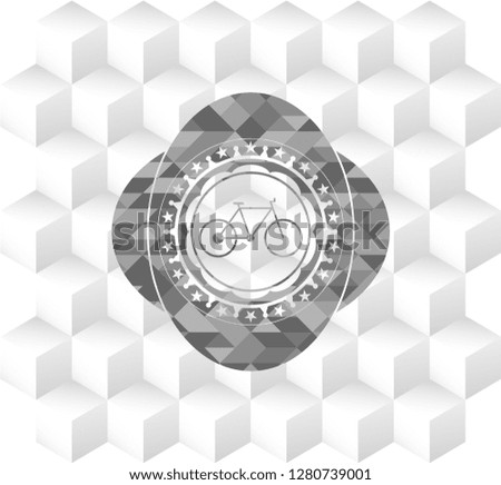 bike icon inside grey emblem with geometric cube white background