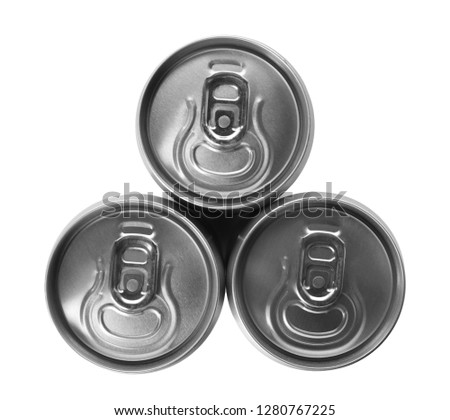 Top view of aluminum cans with beverage on white background