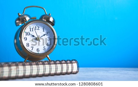 notebook alarm clock background