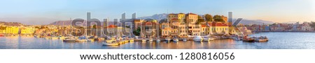 Amazing and Picturesque Old Center of Chania  Cityscape with Ancient Venetian Port in Crete, Greece.Panoramic Image composition Royalty-Free Stock Photo #1280816056