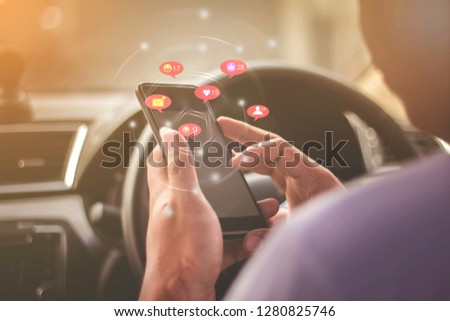 Male businessmen who use phones, social media concepts, smartphones, social media while in the car, social networking concepts with smartphones - images