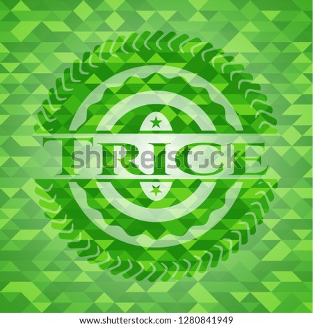 Trice realistic green emblem. Mosaic background