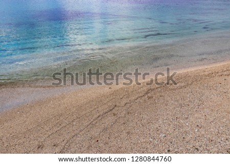 sand and waves in the beach	