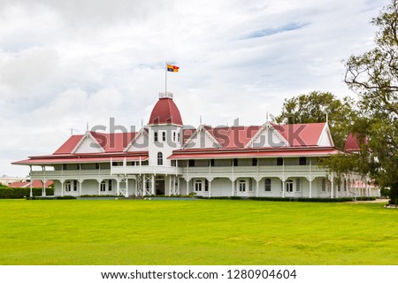 The wooden Royal Palace of the Kingdom of Tonga in the capital of Nukualofa (Nukuʻalofa), Polynesia, Oceania, South Pacific Ocean. Built in 1867, the official residence of the King of Tonga. Royalty-Free Stock Photo #1280904604