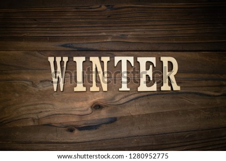 A Wooden accessory written Winter