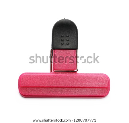 Red binder clip isolated on white background