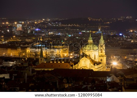 Prague street and city at night
