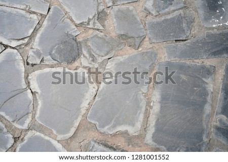 black stone or rock floor decorated