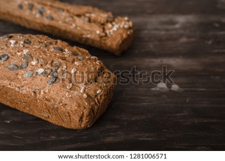 chrono breads on wooden brown background with copy space