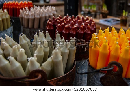 Taper candles in shop Royalty-Free Stock Photo #1281057037