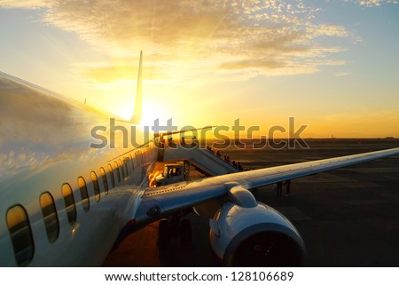 aircraft in airport at sunset Royalty-Free Stock Photo #128106689