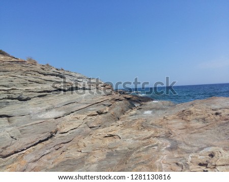Amazing seascape on a rocky beach in Sifnos island, Greece