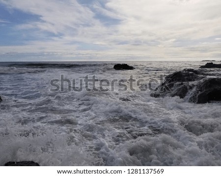 Beautiful waves splashing over rock at Jaco Beach Costa Rica nature, waves, beach, water