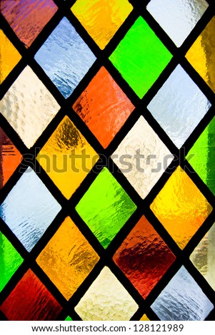 stained glass window of colored glass Royalty-Free Stock Photo #128121989