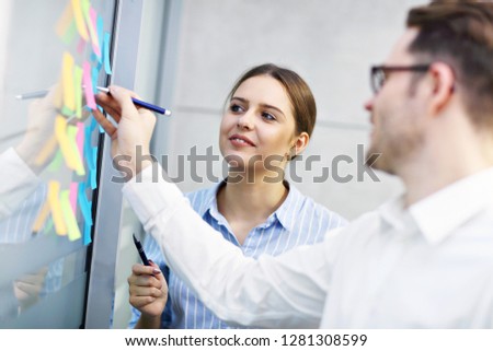 Group of business people brainstorming their ideas