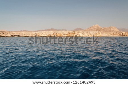 Sinai mountains and picturesque landscapes of the red sea in Egypt. Boat trip on the red sea.
