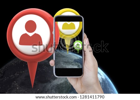 Hand holding mobile phone against white background against green application symbol