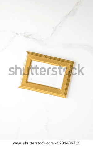 golden photo frame on marble, flatlay mockup - decor and mockup flatlay styled concept