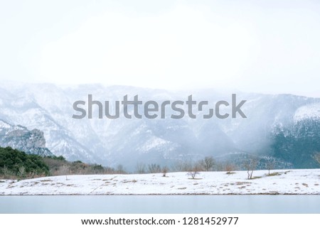 Frozen winter forest with snow covered trees. Frosty day, calm wintry scene. Location  Europe. Ski resort. Great picture of wild area. Tourism concept. Winter mountain snow forest scene.