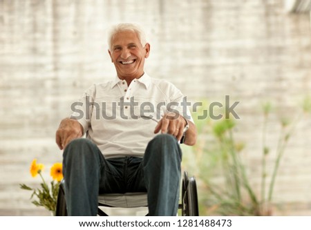 Portrait of senior man in wheelchair.