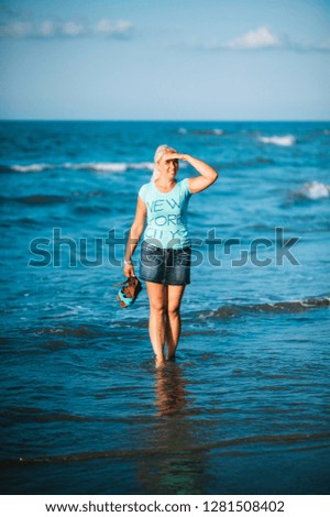 Happy girl in the ocean