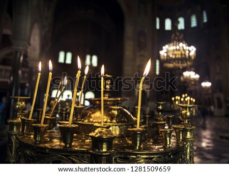 Lit candles inside Cathederal, Bulgaria