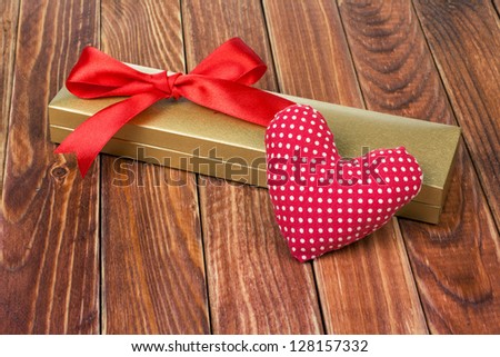 Valentine card with heart and gift box