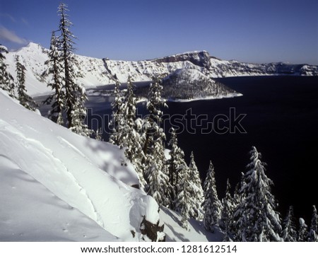 Crater Lake National Park after a snow storm and Wizzard Island, Oregon