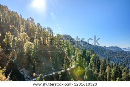 View from hilly mountain road travelling through Himalayas mountains near Munsiyari, Uttarakhand, India.