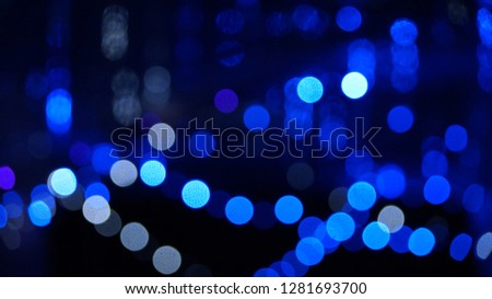 Blue dotted blurry lights background
