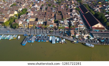 Panorama of Hoi An market with text "Cho Hoi An" on the wall in Vietnamese means HoiAn market. Royalty high-quality free stock photo image top view of Hoai river and boats traffic in Hoi An, Vietnam