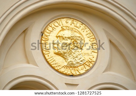 Facade detail of the Nobel Peace Center in Oslo, Norway decorated with an enlarged copy of the Nobel Peace Prize medal. Royalty-Free Stock Photo #1281727525