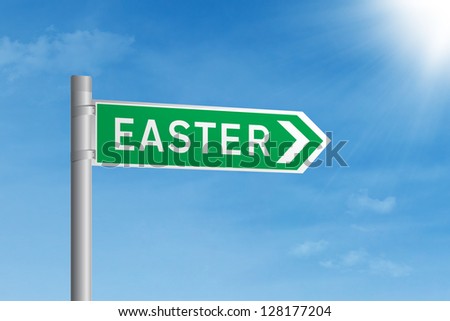 Green Easter road sign on blue sky