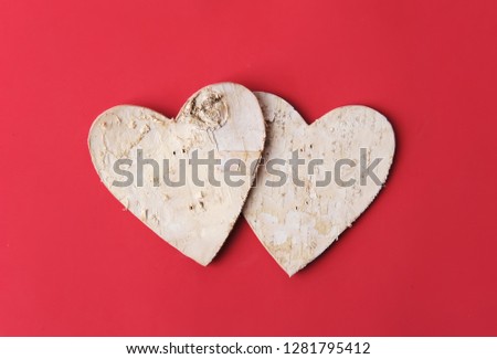 Love forever. Heart shape make of tree bark on red paper