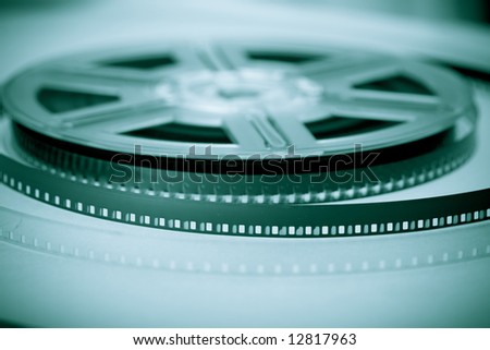 Film reel - concept background. Movie industry symbol.