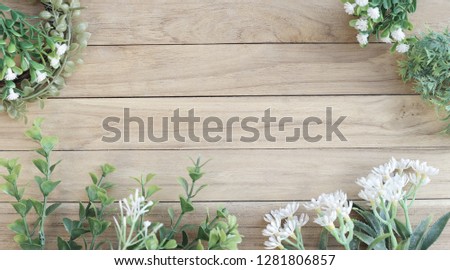 Middle Space on Wooden Board Among Flower and Green Plan, Colorless Picture 