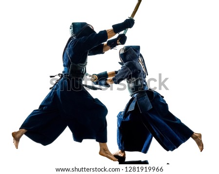 two Kendo martial arts fighters combat fighting in silhouette isolated on white bacground Royalty-Free Stock Photo #1281919966