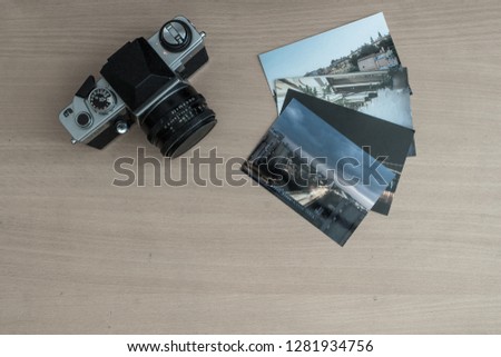 Vintage camera and developed photos