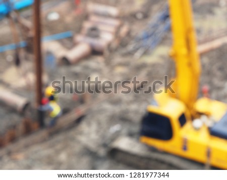 Blurred image of construction of the new building, Images blur and out focus of Workers are working on piling bored piles to make foundations.construction concept