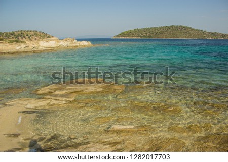 picturesque idyllic sand and rocky tropic south beach in Mediterranean European district part of Earth, resort and summer vacation touristic concept photography landscape 