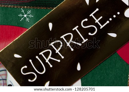 Detailed image of brown surprise placard.