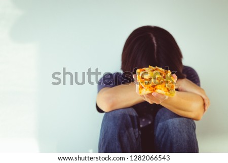 Diet men feeling sad on white background, Can't eat pizza. Diet ,Healthy food.