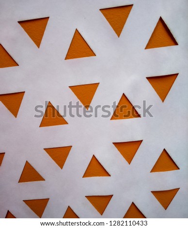 abstract background with orange and white colors of mosaic textured of triangles and low poly
