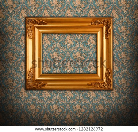 Golden picture frame on white background. Vintage baroque style object.