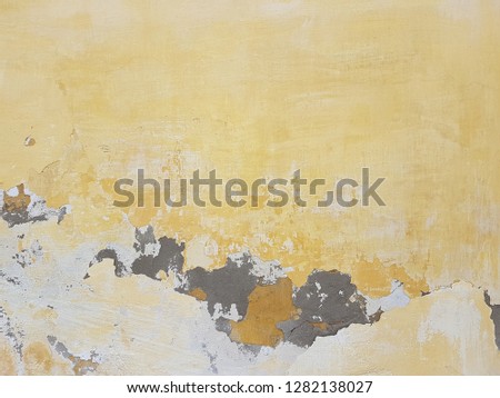 Grunge aged wall texture light yellow color cement concrete background
