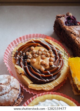 Peanut butter and chocolate tart and other pastry items.