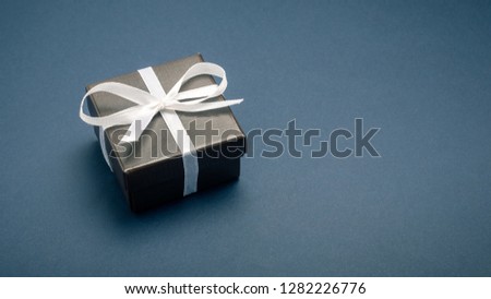 gift wrapped in a red box with a picture of a heart for Valentine's Day